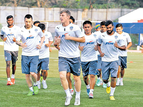 Bengaluru FC players train ahead of their tie with DSKShivajians. DH PHOTO
