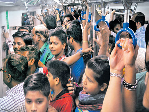 Jam-packed: Heavy rush was the order of the day at Kempegowda station in Bengaluru on Sunday. DH photo/ B K Janardhan