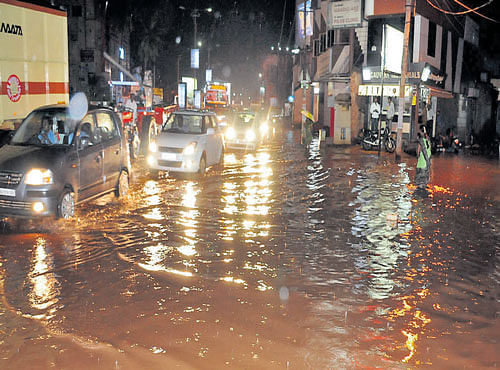 A waterlogged road following heavy rain in Hubballi. DH PHOTO