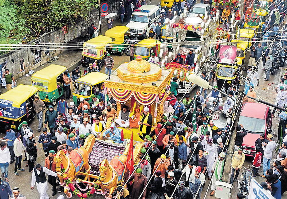 Muslims take out a procession as part of Eid-e-Milad on Tannery Road on Tuesday. DH photo