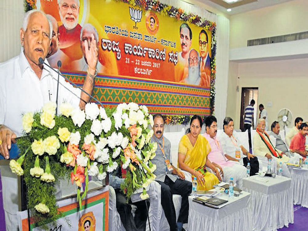 State BJP president B S Yeddyurappa addresses the party's state executive meeting in Kalaburagi on Sunday. DH PHOTO