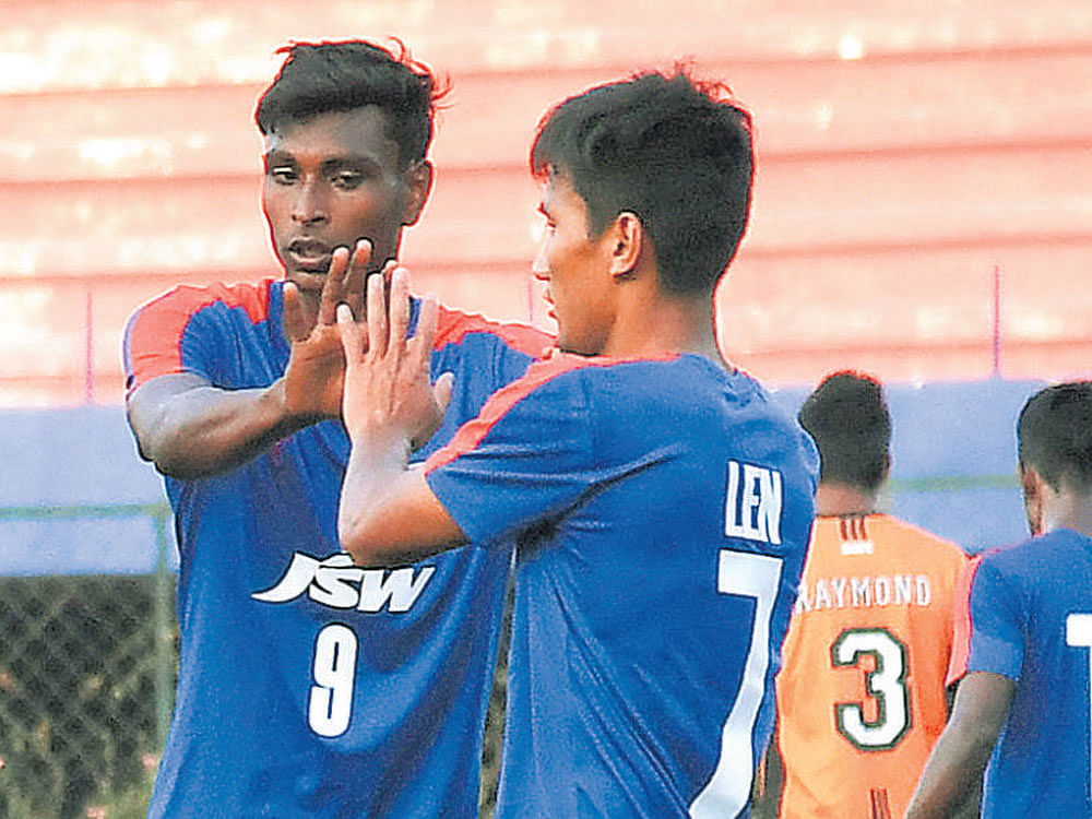 Nice one: Bengaluru FC's Sourav TP (left) celebrates with team-mate after scoring against South United. DH photo