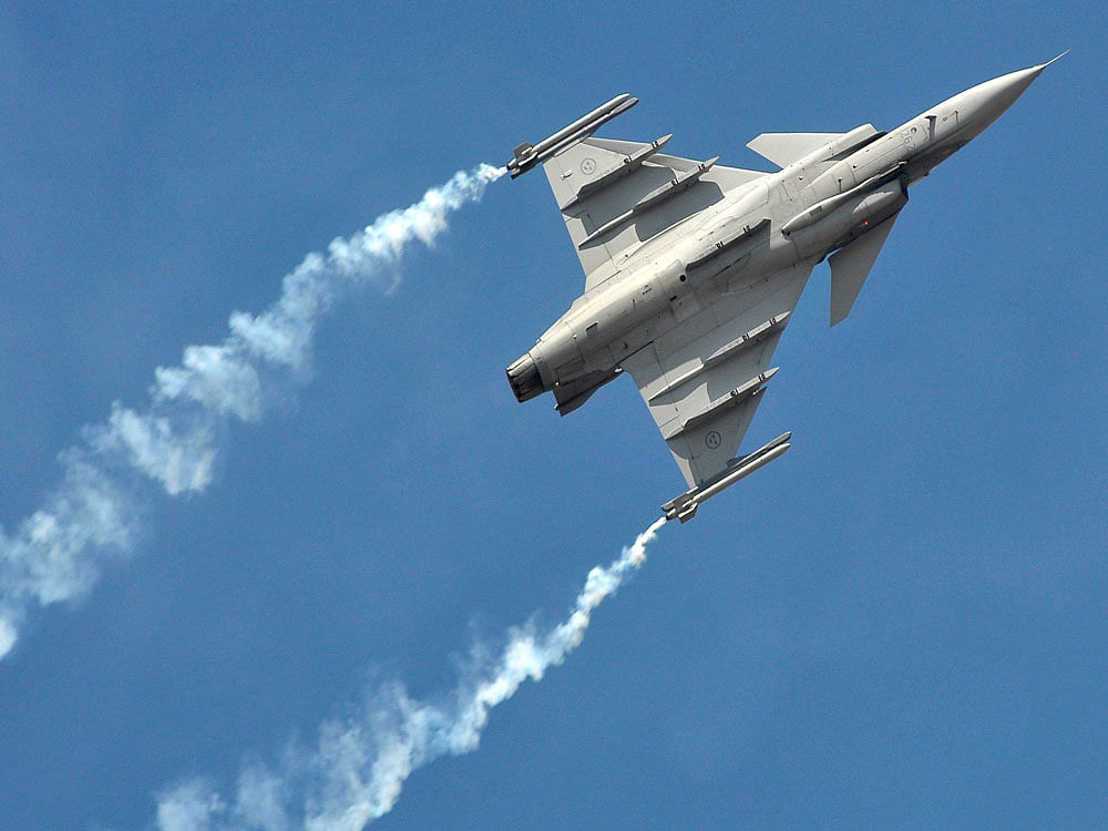 A SAAB Gripen fighter plane flies during the Aero India show at the Yelahanka Air Force Station in Bengaluru. PTI photo