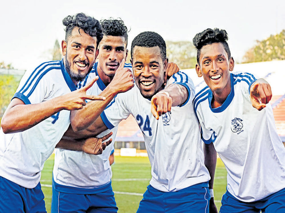 goal machine Students Union's Emmanuel (second from right) celebrates after scoring against Bengaluru FC. DH&#8200;Photo