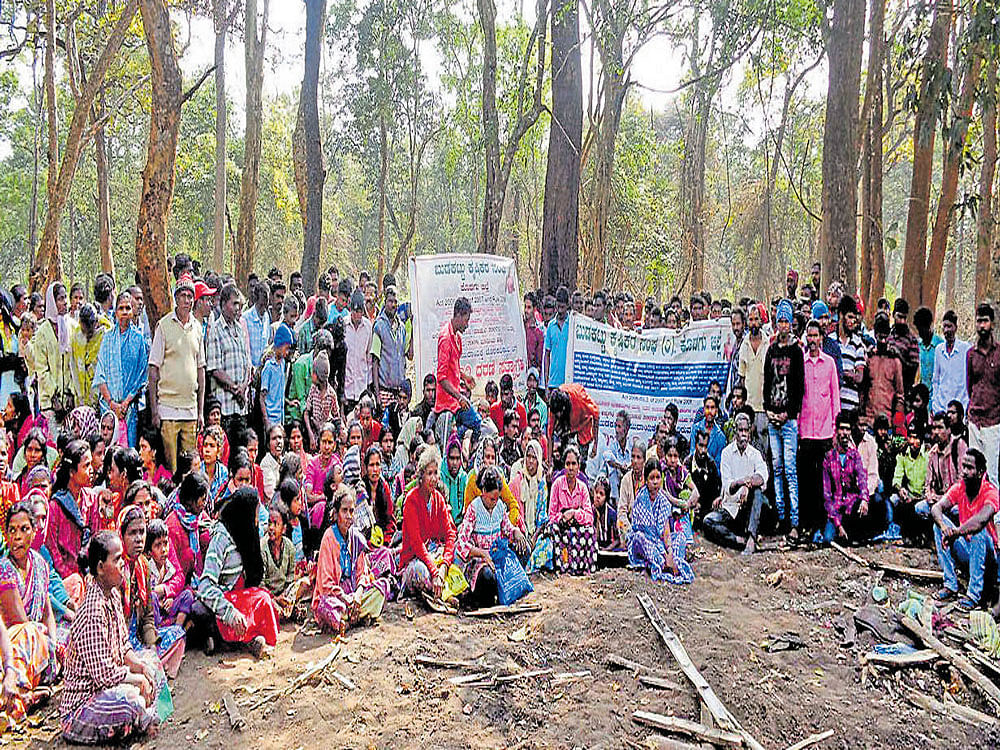 A file photo of protest by tribals in Diddalli in Kodagu district. Displaced tribals hope that Chief Minister Siddaramaiah would take a favourable decision during the meeting convened on Tuesday in Bengaluru.