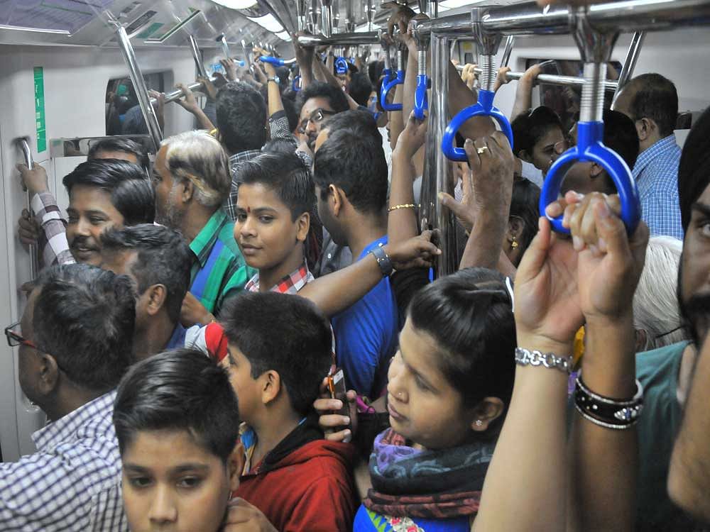 Hundreds of passengers were stuck in the Kempegowda Metro Station after the last trains left around 10.15 pm. The sudden rush of passengers led to long queues at the token counters. The last trains on both directions - towards Mysuru Road and Baiyappanahalli - left the station even as many waited in line. DH file photo