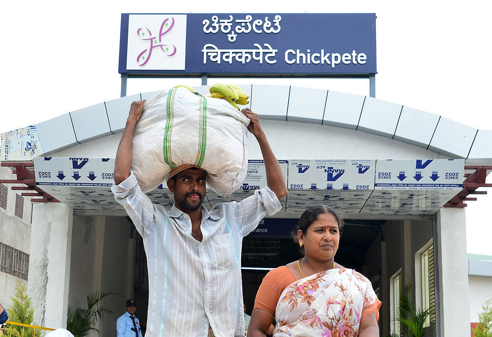 Commuters exit from Namma Metro's Chickpet station. DH photo