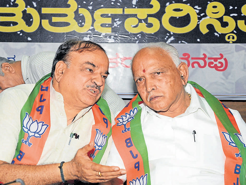 Union Minister Ananth Kumar and BJP&#8200;state president  B&#8200;S&#8200;Yedyurappa at an event,