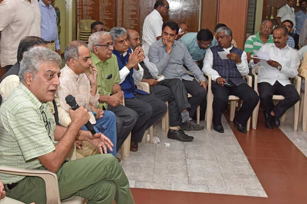 Architect Naresh V Narasimhan makes a point in the presence of activists and politicians during a Citizens' Round Table on Namma Metro and Integration of Public Transport in Bengaluru on Saturday.