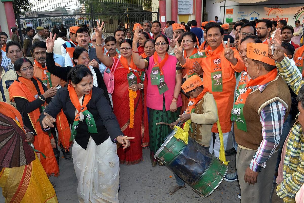 BJP activists celebrating in Varanasi on Friday, after Mridula Jaiswal won the Mayor's post in the Varanasi civic election. PTI Photo