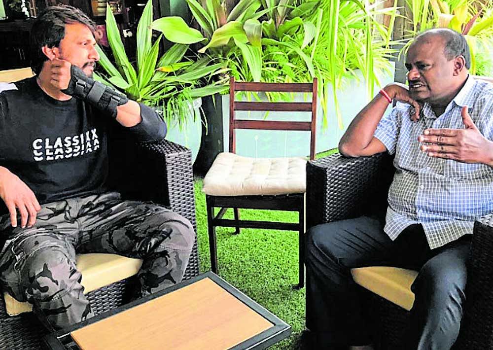 JD(S) state president H D Kumaraswamy and actor Sudeep at latter's residence in Bengaluru on December 17.