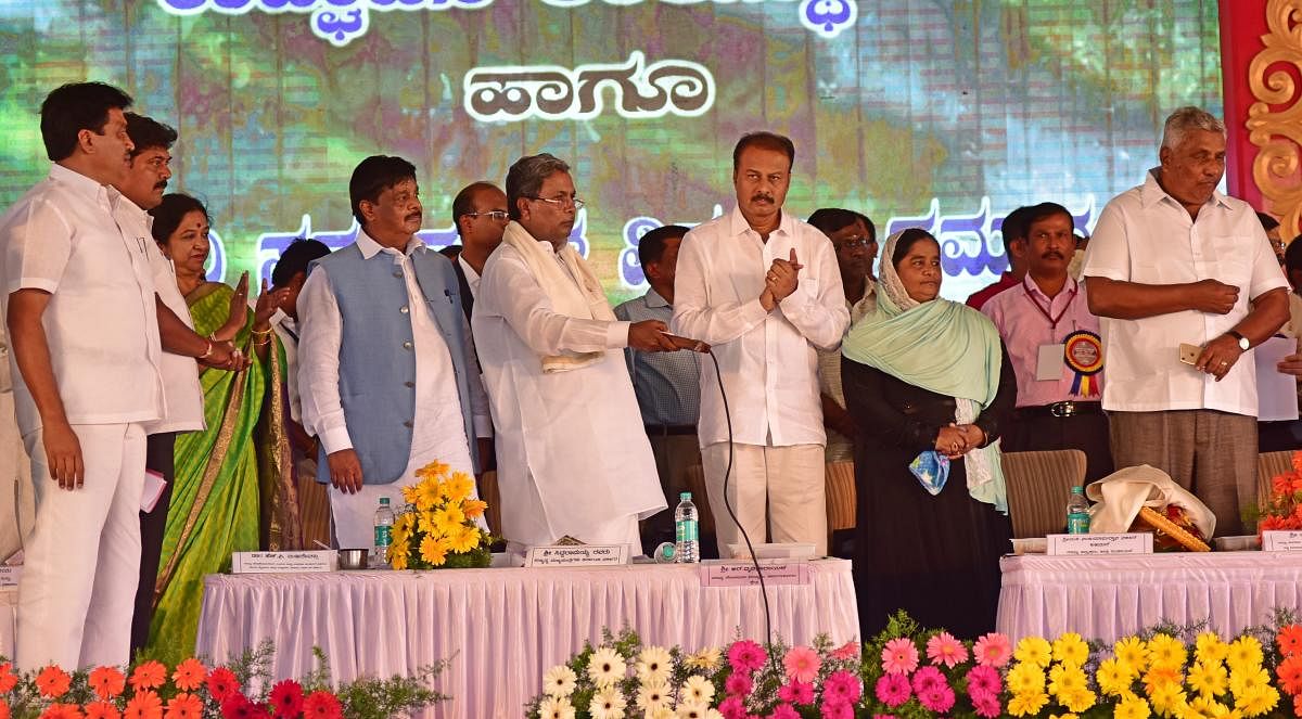 Chief Minister Siddaramaiah inaugurates various development programmes at Sargur in HD Kote taluk in Mysuru district. Ministers M C Mohana Kumari, H C Mahadevappa, MP R Dhruvanarayan are seen. dh photo