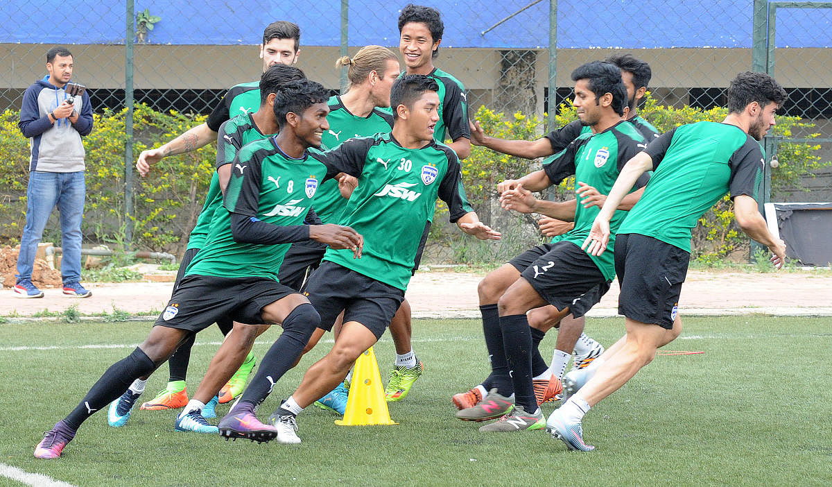 IN HIGH SPIRITS: BFC players train on the eve of their ISL match against FC Pune City at the Sree Kanteerava Stadium in Bengaluru on Thursday. DH Photo/ Srikanta Sharma R