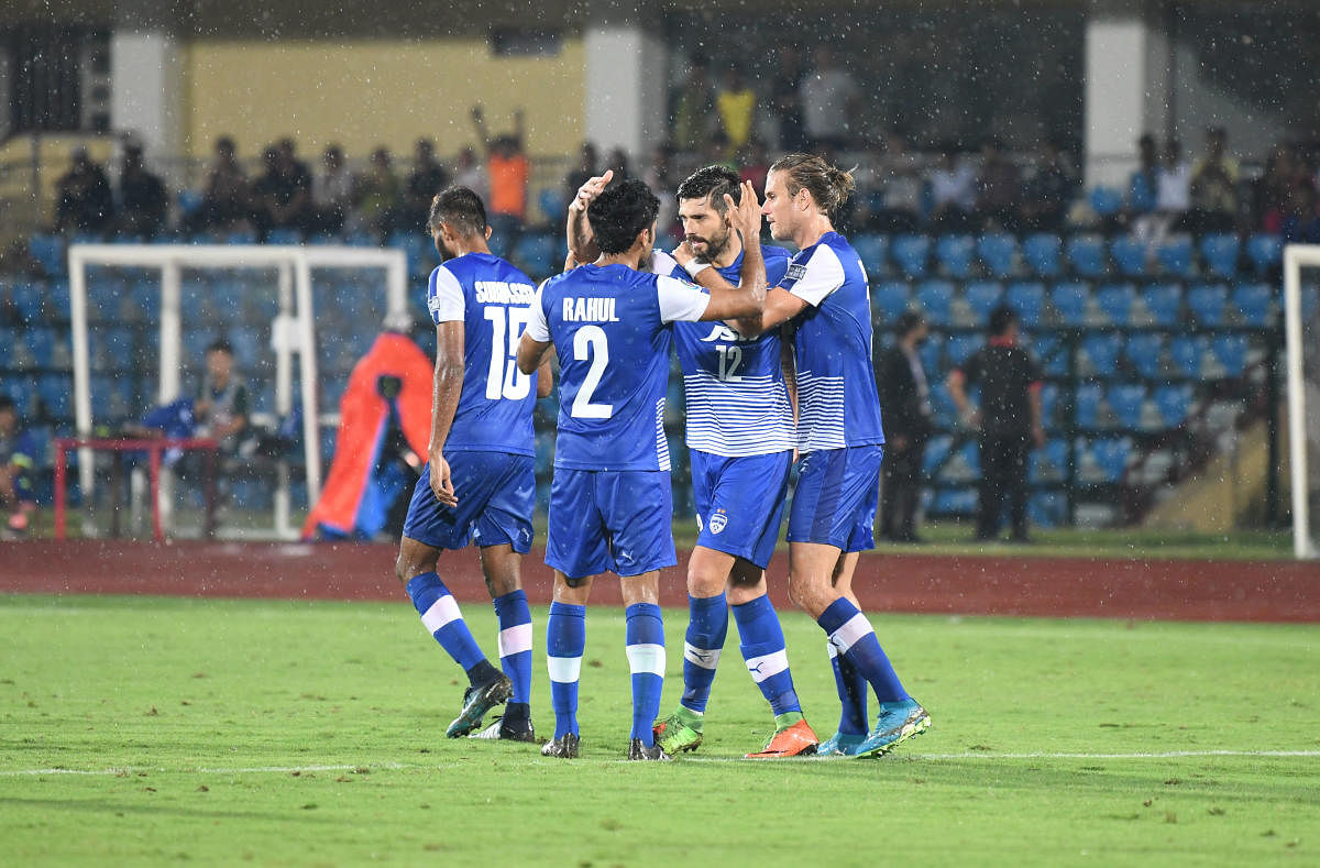 Bengaluru FC players celebrate after Daniel Segovia (second from right) scored the equaliser against Aizawl FC in an AFC Cup fixture on Thursday. BFC MEDIA