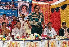 turmoil Congress leader and former union minister Ambareesh speaking at a programme, in Mandya on Sunday. DH Photo