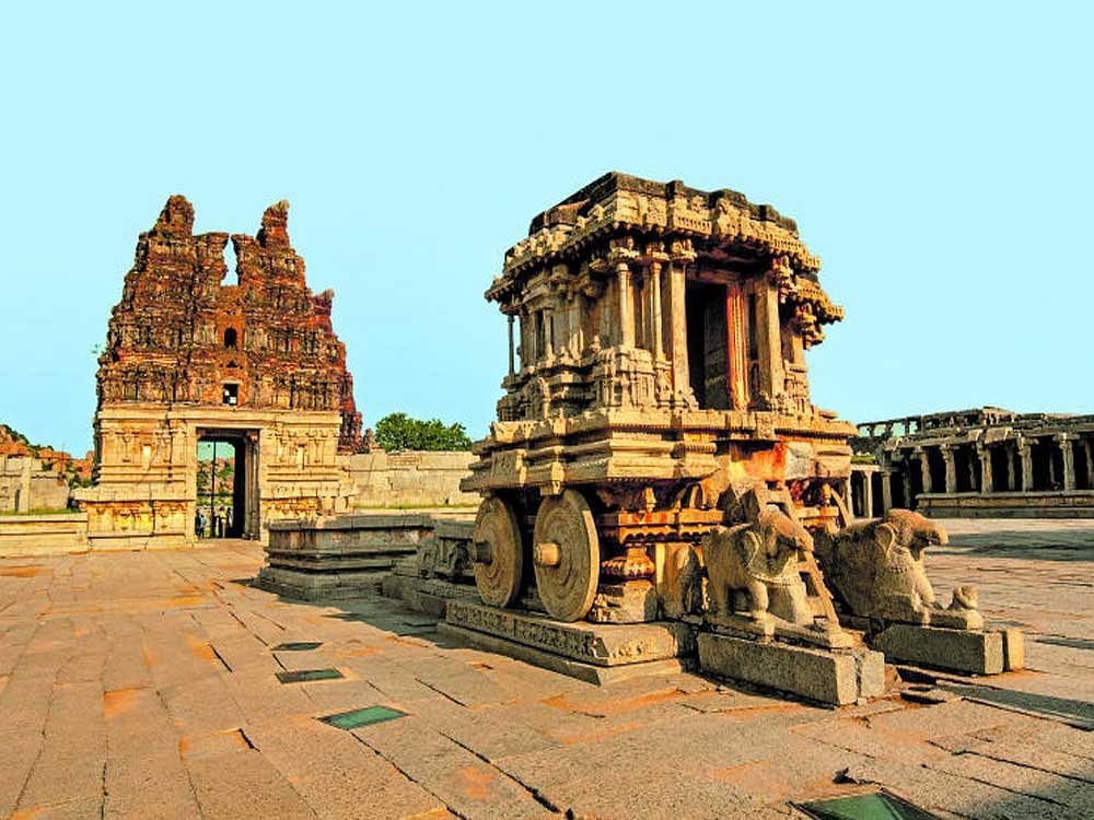 Chariot and Vittala temple at UNESCO heritage site Hampi in Karnataka, India. Getty image.