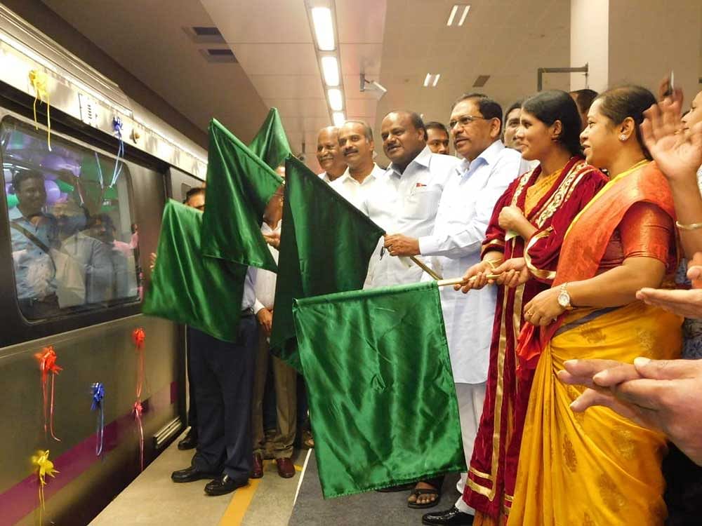 Chief Minister H D Kumaraswamy on Thursday, inaugurated a bridge connecting Kempegowda metro station with the two bus stations and flagged-off the second six-car train of Namma Metro. DH Photo 