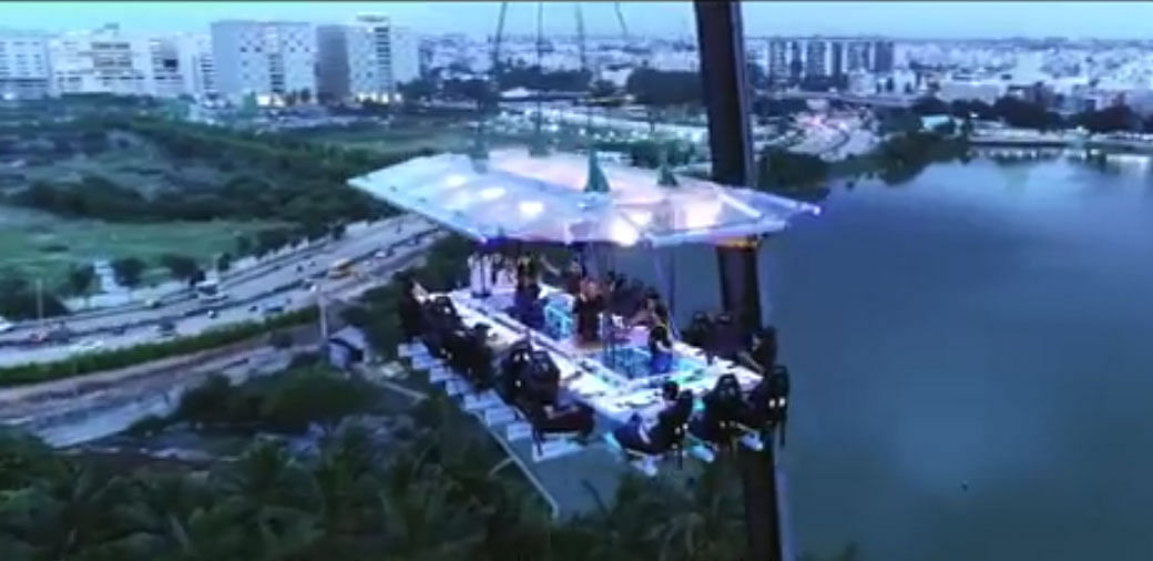 A dining deck lifted by a crane with a breath-taking view of the Nagawara Lake, Manyata Techpark and Bangalore’s Green Cover. Screen Grab