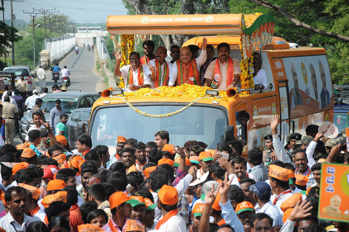 BJP National President Amit Shah on a roadshow. DH HOTOS