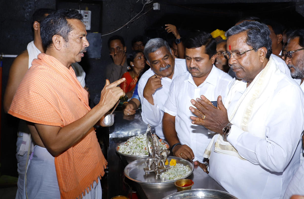 Former chief minister Siddaramaiah offers prayers at the famous Banashankari temple in Badami, during his maiden visit to his Assembly constituency on Thursday. DH PHOTO