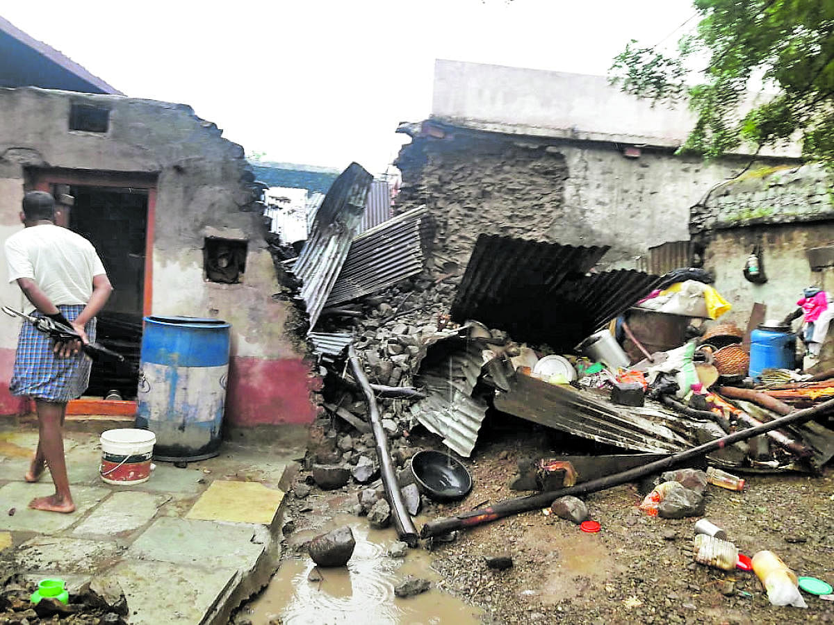 A portion of the wall of a house fell on the neighbouring one, killing three and injuring one at Hithal Sirur village, Aland taluk, Kalaburagi district, on Wednesday night. DH PHOTO