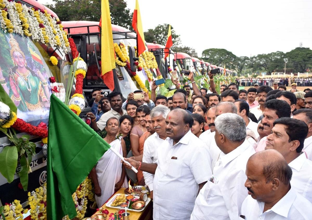 Chief Minister H D Kumaraswamy flags off 20 new buses, in Mandya, on Wednesday.