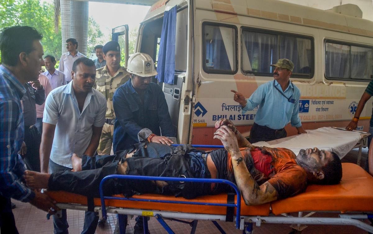 Injured employees being taken for treatment after a blast at the Bhilai Steel Plant of state-owned SAIL in Durg. PTI Photo