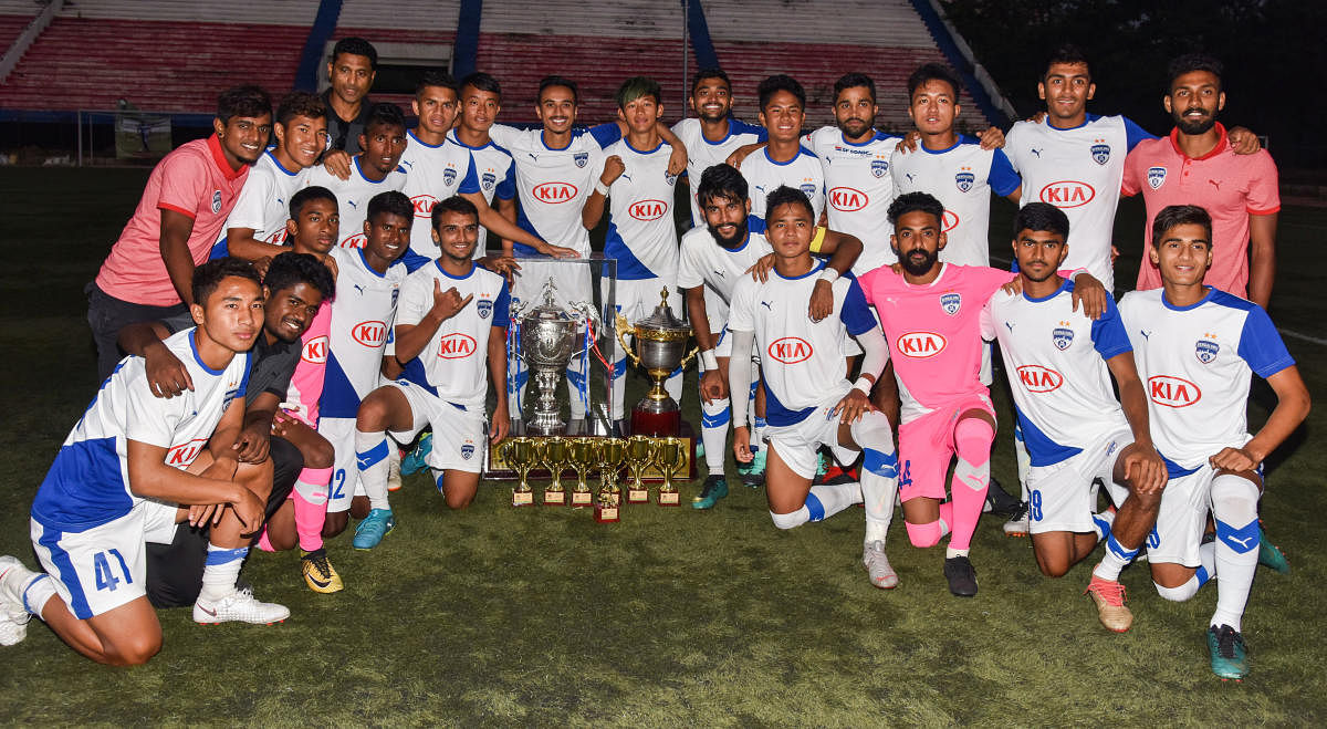 Bengaluru FC 'B' champions of the C Puttaiah Memorial Trophy. (From left) STANDING: Prashanth Kalinga, Biswa Darjee, Leon Augustine, Naushad Moosa (head coach), Ajay Chhetri, Roshan Singh, Parag Shrivas, Lalhmunmawia, Asheer Akthar, Lalengzama