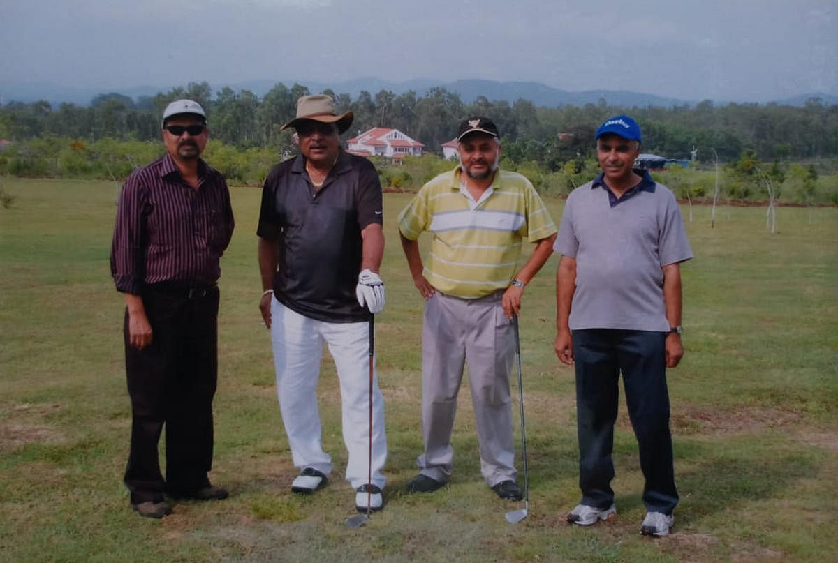 A file photo of Ambareesh with Golf Club president A B Sudarshan in Chikkamagaluru.