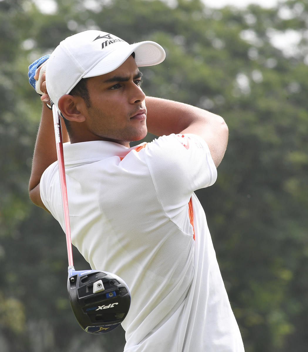 Chandigarh's Aadil Bedi of tees off during the second round of the Bengaluru Open on Friday. DH Photo/ Srikanta Sharma R