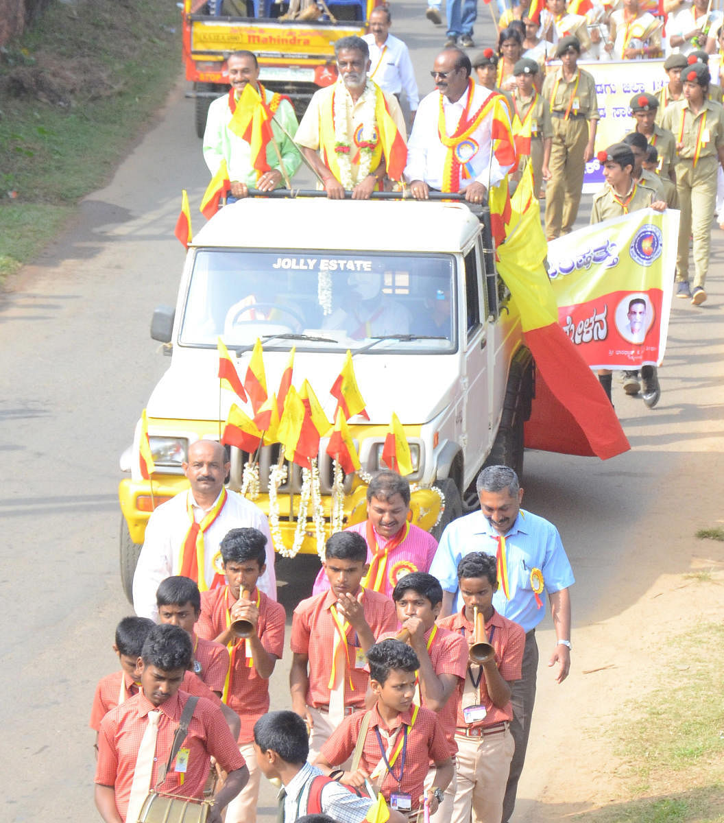 The 13th district Kannada Sahitya Sammelan President Bharadwaj K Anandatheertha being taken out in a procession in Napoklu.
