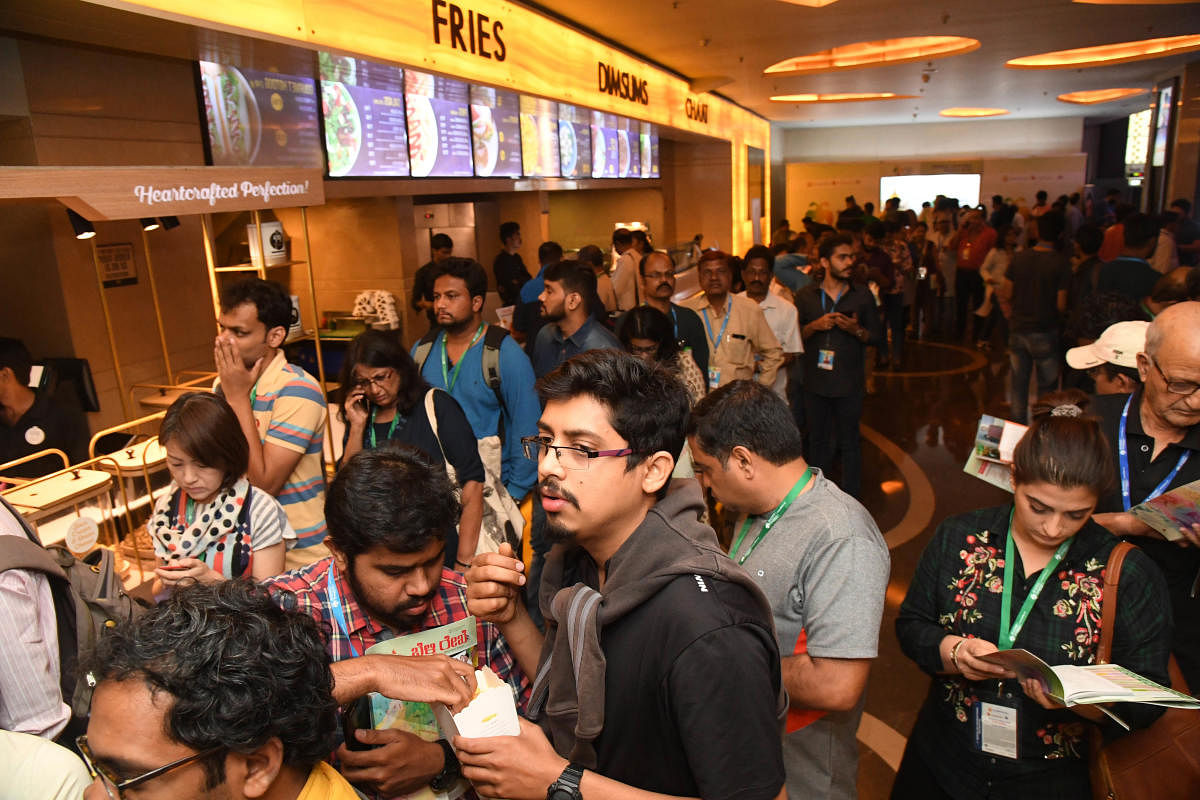 Film buffs line up to get tickets on the first day of the Bengaluru International Film Festival at the Orion Mall on Friday. DH PHOTO/B H Shivakumar