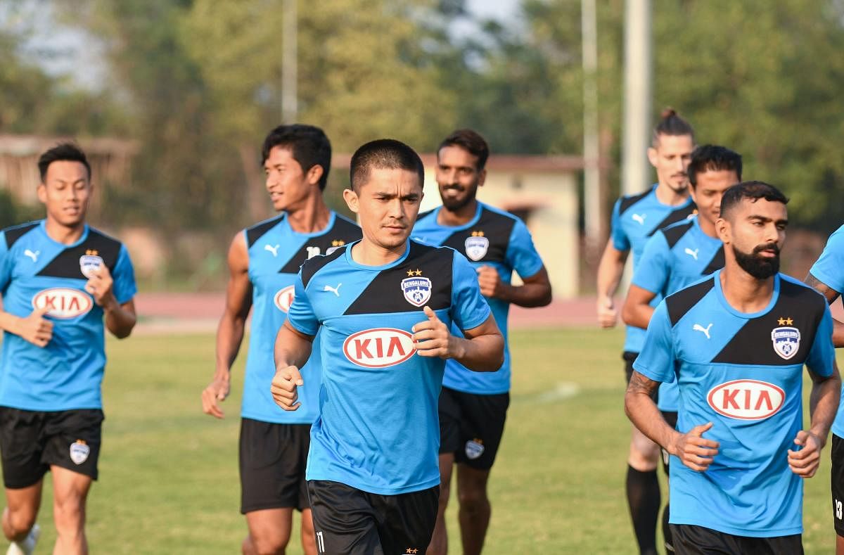 ALL SET Sunil Chhetri leads the BFC players through a training session in Guwahati on Wednesday. BFC media