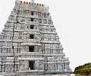 Damaged: The raja gopuram at the Srikalahasthi temple in Andhra Pradesh which collapsed after developing a huge crack through its seven tiers on Wednesday. Pic DInakaran