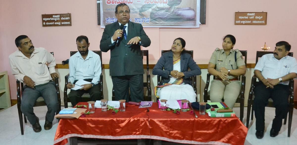 Principal District and Sessions Judge Veerappa V Mallapure speaks during an interactive programme at the Press Club in Madikeri recently.