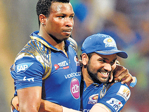 Keiron Pollard (left) and Rohit Sharma are key performers forMumbai Indians