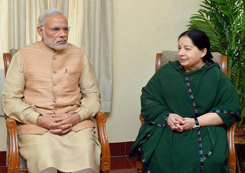 Prime Minister Narendra Modi in a meeting with the Chief Minister of Tamil Nadu J. Jayalalithaa during his visit to flood affected areas in Tamil Nadu on Thursday. PTI Photo