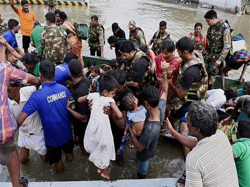 The rains have caused widespread destruction in the districts of Chennai, Cuddalore, Kanchipuram and Thiruvallur in Tamil Nadu. By all accounts, the state capital bore the brunt. Officials said they expected the death toll to rise once the water levels go down, revealing drowned bodies.PTI  Photo.