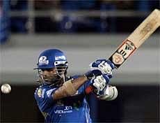 Mumbai Indians captain Sachin Tendulkar hits a shot against Kolkata Knight Riders during their Indian Premier League match in Mumbai on Monday. PTI