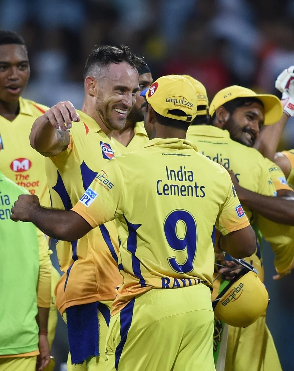 MAN OF THE MOMENT: Chennai Super Kings' Faf du Plessis is flocked by his team-mates after the right-hander scripted his team's win with a brilliant knock against Sunrisers Hyderabad. PTI