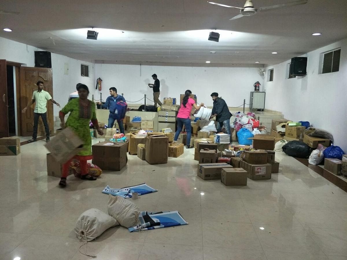 Members of The Blue Umbrella packing relief material in the city for those affected by Cyclone Gaja in Tamil Nadu.