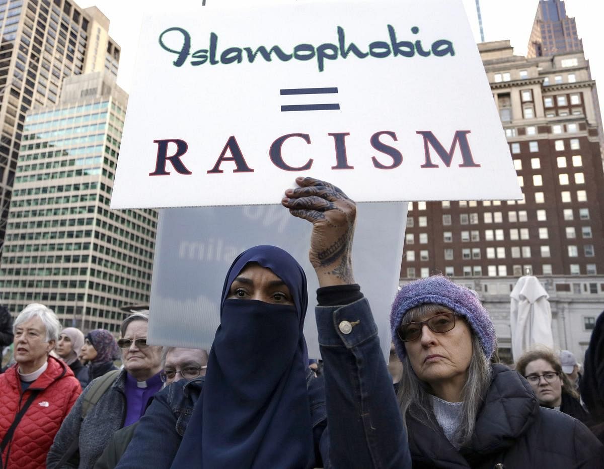 An interfaith gathering is held in Philadelphia on March 16, 2019, to mourn the Muslim worshippers killed during a mass shooting in Christchurch, New Zealand. AP