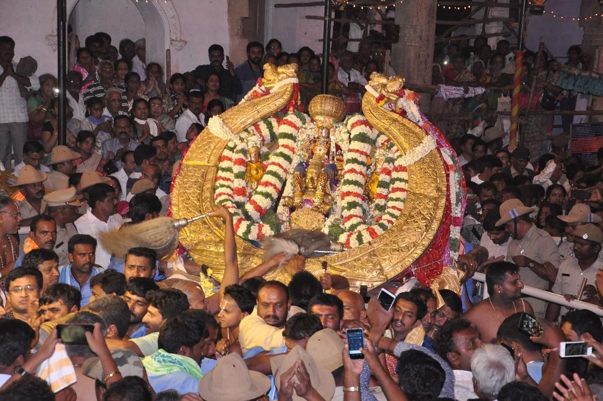 The idol of Lord Cheluvanarayanaswamy adorned with the diamond-studded crown during Vairamudi Utsav, at Melkote on Sunday evening.