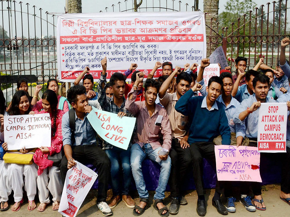 Members of All India Students' Federation (AISF) and Revolutionary Youth Association (RYA) staging a protest demonstration in front of Prasanti Uddyan in Guwahati on Thursday. They were protesting against ABVP members for their alleged violence outside Ramjas College in Delhi University. PTI Photo