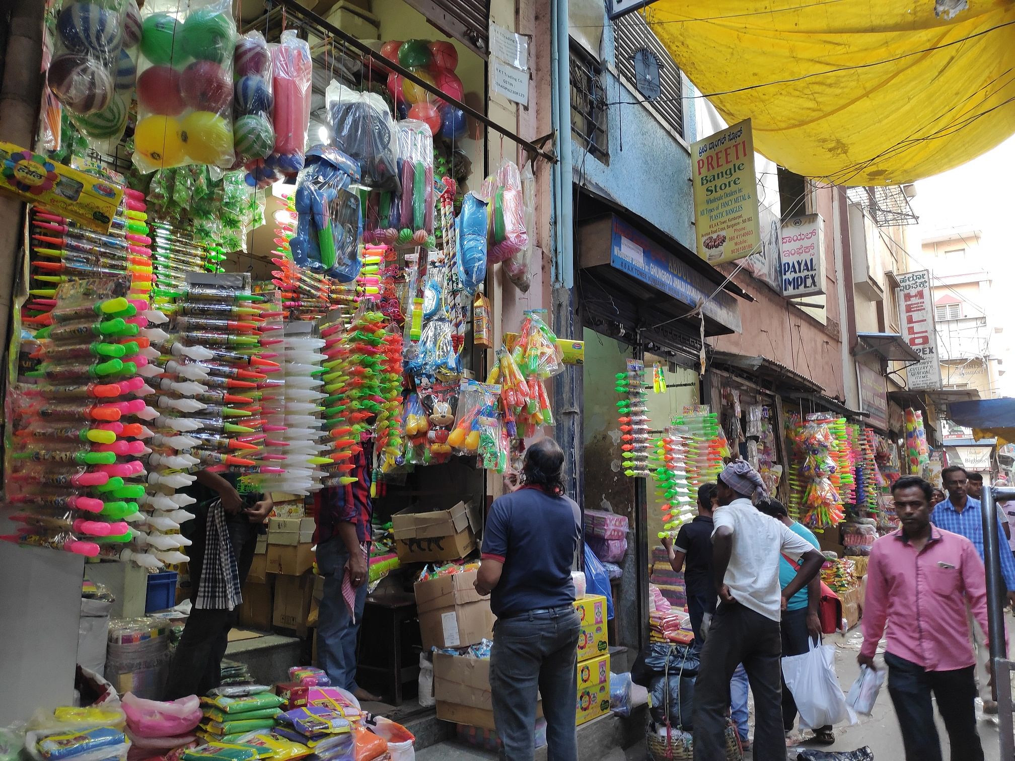 Old Tharagupete Street is buzzing with shoppers for Holi (Kamana Habba).