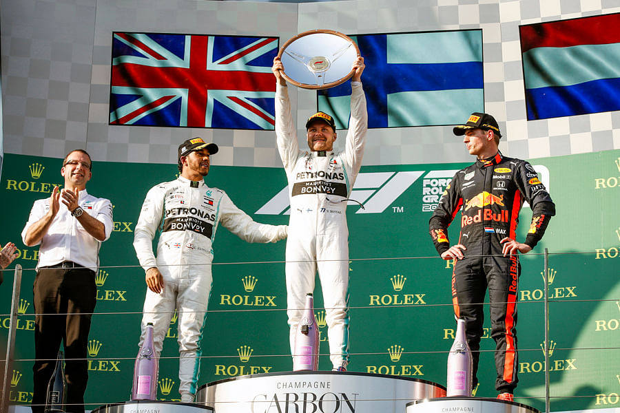 Mercedes driver Valtteri Bottas on the Australian Grand Prix podium with team-mate Lewis Hamilton and Max Verstappen. Picture credit: Mercedes