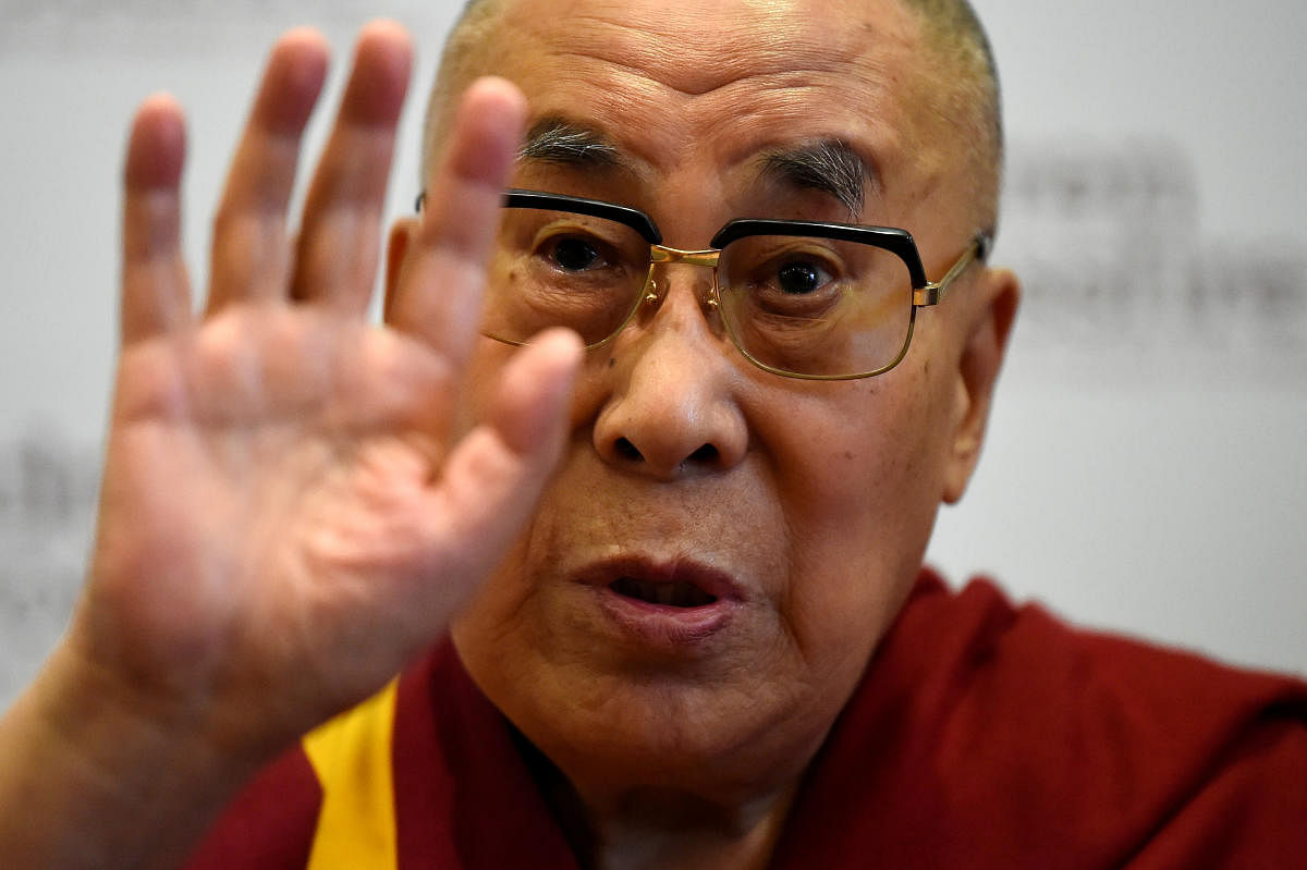 FILE PHOTO: Tibetan spiritual leader the Dalai Lama, Patron of Children in Crossfire, speaks during a press conference in Londonderry, Northern Ireland September 11, 2017. REUTERS/Clodagh Kilcoyne/File Photo