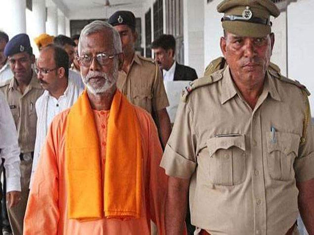 The special NIA court in Panchkula near here this evening acquitted former RSS activist Swami Aseemanand and three others in the Samjhauta Express blast case. (Image courtesy Twitter)
