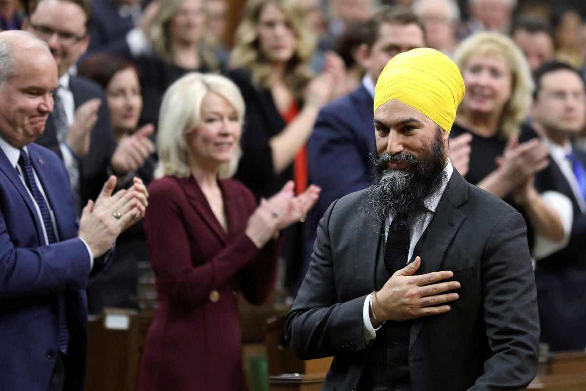 Singh, 40, the leader of the New Democratic Party, placed his hand over his heart as he walked into the House of Commons. Reuters File Photo