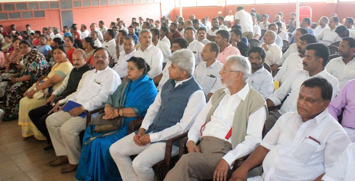Congress leaders and workers take part in the election preparation meeting held in Madikeri on Wednesday.